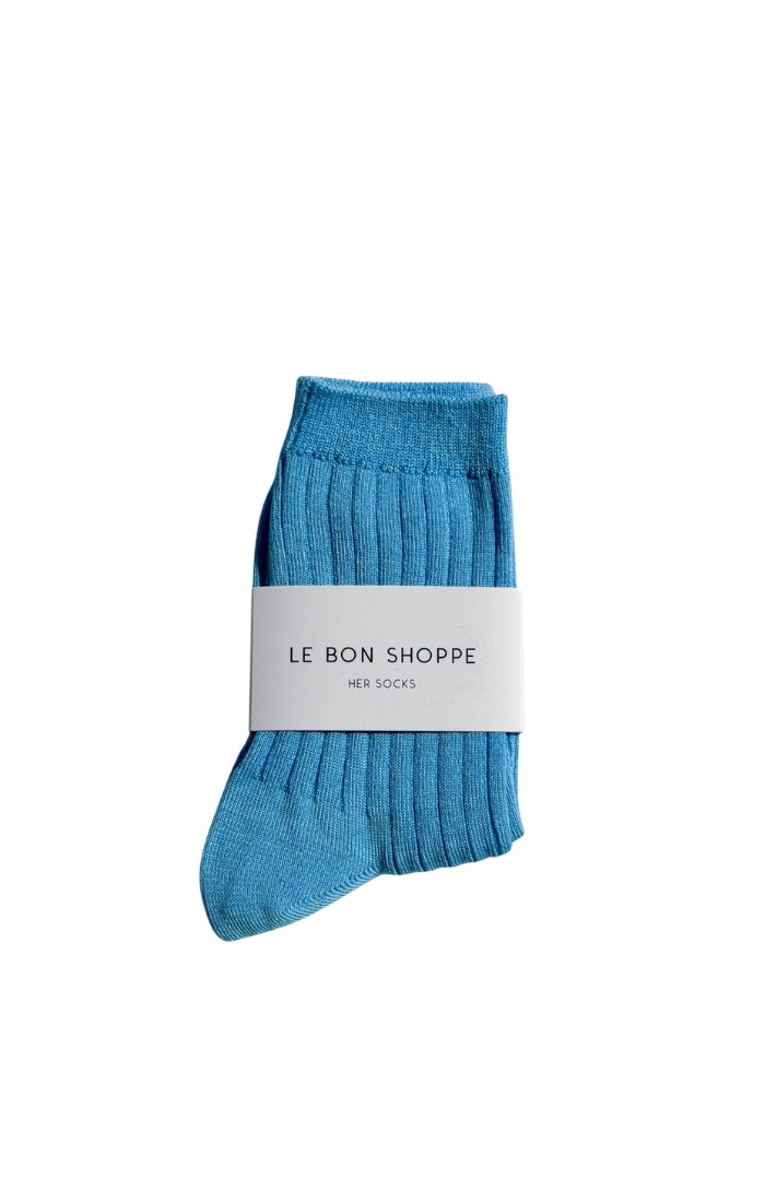 Her Socks in Blue Water